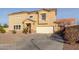 Two-story home featuring desert landscaping, neutral color scheme, and solar panels at 7611 S 15Th St, Phoenix, AZ 85042