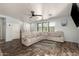 Living room with wood look floors, light walls, and ample seating at 7611 S 15Th St, Phoenix, AZ 85042