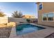 Inviting backyard pool and spa with outdoor seating, perfect for relaxation and enjoying warm weather at 7611 S 15Th St, Phoenix, AZ 85042