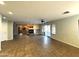 Spacious living room with tile flooring, fireplace, and sliding glass doors at 765 S Ruby Pl, Gilbert, AZ 85296