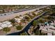 Aerial view of the community's homes lined up along the private airstrip at 8502 E Cave Creek Rd # 10, Carefree, AZ 85377