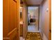 Hallway leading to bedroom and bathroom, with stylish rug at 8502 E Cave Creek Rd # 10, Carefree, AZ 85377