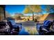 Private patio view with comfortable seating and desert views at 8502 E Cave Creek Rd # 10, Carefree, AZ 85377