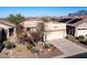 Exterior of a single-Gathering home showcasing its low-maintenance landscaping and desert surroundings at 9796 E Stone Cir Ln, Gold Canyon, AZ 85118