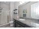 Bathroom featuring granite counters, single sink and walk in shower at 10039 W Jasmine Trl, Peoria, AZ 85383