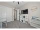 Bedroom with neutral walls and carpet, ceiling fan and closet at 10039 W Jasmine Trl, Peoria, AZ 85383