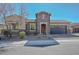 Inviting single-story home featuring manicured desert landscaping, stone accents, and a convenient two-car garage at 10039 W Jasmine Trl, Peoria, AZ 85383