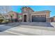Beautiful single-story home featuring desert landscaping, stone accents, and a convenient two-car garage at 10039 W Jasmine Trl, Peoria, AZ 85383