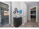 Hallway with access to bedroom, bathroom, and bonus room at 10039 W Jasmine Trl, Peoria, AZ 85383