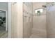 Walk in shower featuring mosaic tile accents at 10039 W Jasmine Trl, Peoria, AZ 85383