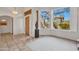 Welcoming entryway with tiled floors, shuttered windows, and elegant design at 10040 E Happy Valley Rd # 249, Scottsdale, AZ 85255