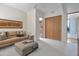 Cozy living room featuring a plush leather couch and carpeted flooring at 10040 E Happy Valley Rd # 249, Scottsdale, AZ 85255