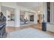 Expansive living space with tiled floors, artwork, and views into other living areas at 10040 E Happy Valley Rd # 249, Scottsdale, AZ 85255