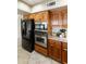 Modern kitchen featuring stainless steel appliances and natural wood cabinets at 10617 E Michigan Ave, Sun Lakes, AZ 85248