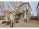 Charming two-story home featuring a covered porch, and inviting curb appeal at 10822 W Taylor St, Avondale, AZ 85323