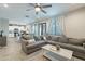 Spacious living room with an open layout to the kitchen and dining area, perfect for entertaining at 10822 W Taylor St, Avondale, AZ 85323