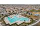 A luxurious community pool and play area are surrounded by beautiful homes in this neighborhood at 10822 W Taylor St, Avondale, AZ 85323