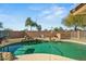 Pool featuring rock features, diving area, and basketball hoop at 14104 N 146Th Ln, Surprise, AZ 85379