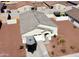 Attractive home featuring a spacious driveway and tidy desert landscaping at 1418 E Peggy Dr, Casa Grande, AZ 85122