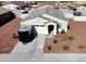 Inviting single-story house with a two-car garage and well-maintained gravel yard at 1418 E Peggy Dr, Casa Grande, AZ 85122