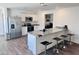 Modern kitchen featuring stainless steel appliances and an island with bar seating at 1418 E Peggy Dr, Casa Grande, AZ 85122