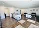 Bright, open-concept living and dining area with modern finishes and neutral decor throughout at 1418 E Peggy Dr, Casa Grande, AZ 85122