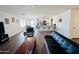 Bright, open-concept living room and kitchen area with seamless flow and modern finishes at 1418 E Peggy Dr, Casa Grande, AZ 85122
