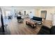 Spacious living room and kitchen area with sleek furniture and ample natural light at 1418 E Peggy Dr, Casa Grande, AZ 85122