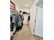 An organized walk-in closet features an open design and ample storage to maximize space and convenience at 1418 E Peggy Dr, Casa Grande, AZ 85122