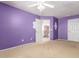 Cozy bedroom featuring a ceiling fan, carpet, and easy access to the home's upper level at 1422 S Colt Dr, Gilbert, AZ 85296