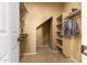 Spacious walk-in closet featuring shelving and rods for ample storage and organization at 1422 S Colt Dr, Gilbert, AZ 85296