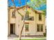 Charming two-story home featuring a private balcony, neutral stucco, and well-maintained landscaping at 1422 S Colt Dr, Gilbert, AZ 85296