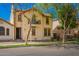 Inviting two-story home with a balcony, landscaped front yard, and great curb appeal at 1422 S Colt Dr, Gilbert, AZ 85296