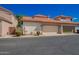 Two-car garage exterior with a beige door and easy access from the street, showcasing functionality and curb appeal at 1422 S Colt Dr, Gilbert, AZ 85296