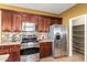 Spacious kitchen with stainless steel appliances and ample cabinet space at 1422 S Colt Dr, Gilbert, AZ 85296