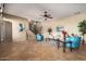Spacious living room with neutral walls, tile flooring, and staircase access at 1422 S Colt Dr, Gilbert, AZ 85296