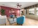Stylish living room with tile floors, neutral walls, and a glimpse of the kitchen at 1422 S Colt Dr, Gilbert, AZ 85296