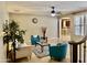 Cozy living room with ceiling fan, neutral walls, and view to the kitchen at 1422 S Colt Dr, Gilbert, AZ 85296