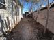 Backyard space with gravel, plants, and fencing for privacy and definition at 1637 E Brill St, Phoenix, AZ 85006