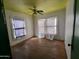A bedroom with hardwood floors, natural light, and ceiling fan at 1637 E Brill St, Phoenix, AZ 85006