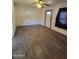Spacious living room featuring hardwood floors, and natural light, offering a blank canvas for customization at 1637 E Brill St, Phoenix, AZ 85006