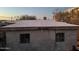 Back exterior of the house showing the roof and window details at 1637 E Brill St, Phoenix, AZ 85006