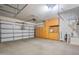 Spacious garage with cabinets and ample storage space at 17550 W Buckhorn Trl, Surprise, AZ 85387