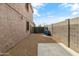 Functional side yard with gravel landscaping, block wall, and potential for storage or other use at 17629 N 24Th Way, Phoenix, AZ 85032