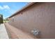 Home exterior with a brick walkway and stucco siding at 17637 N Goldwater Dr, Surprise, AZ 85374