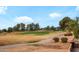 Picturesque golf course featuring green fairways, trees, and a paved path at 17637 N Goldwater Dr, Surprise, AZ 85374