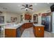 Bright, expansive kitchen with stainless appliances, island, and ample counter space at 17637 N Goldwater Dr, Surprise, AZ 85374