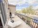 Spacious balcony furnished with lounge chair, table and chairs, enhanced by neighborhood views at 18515 N 94Th St, Scottsdale, AZ 85255