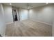 A bright bedroom with carpet, neutral paint and large closet with white bi-fold doors at 18515 N 94Th St, Scottsdale, AZ 85255