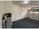 Clean garage offers ample space, a water filtration system, and overhead storage racks at 18515 N 94Th St, Scottsdale, AZ 85255